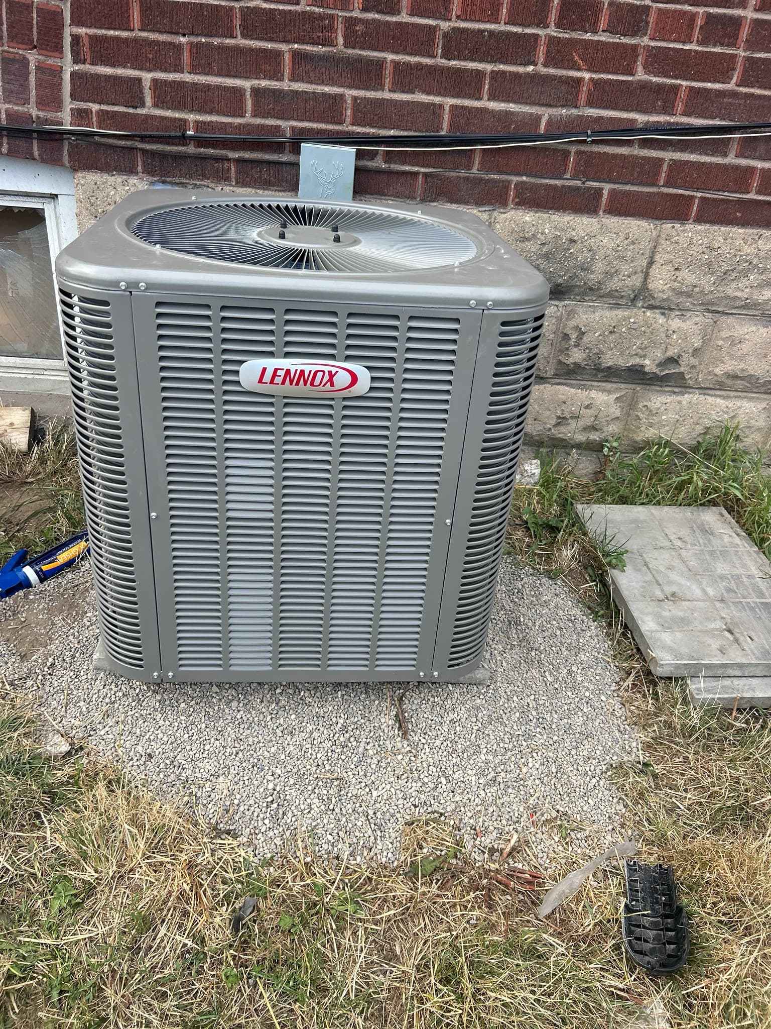 Lennox AC condenser unit installed by Blue HIF₂ Mechanical